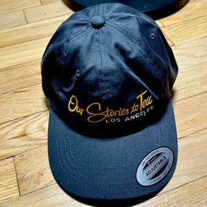 Promotional, dark gray, HBO our stories pops cap